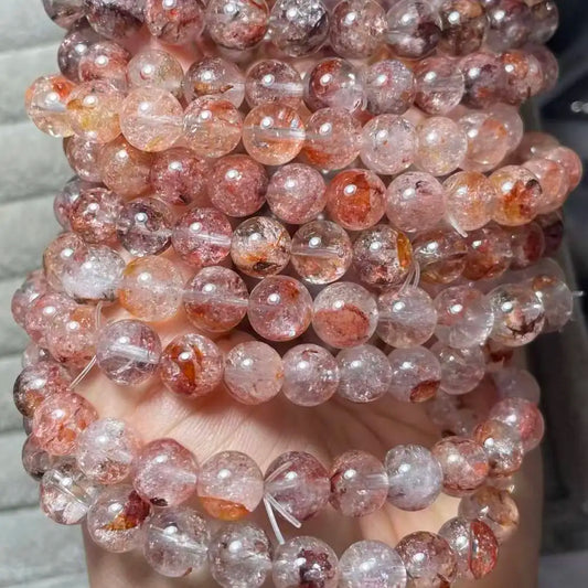 2-3bracelets  approx8-10mm natural inclusions crystal   wholesale