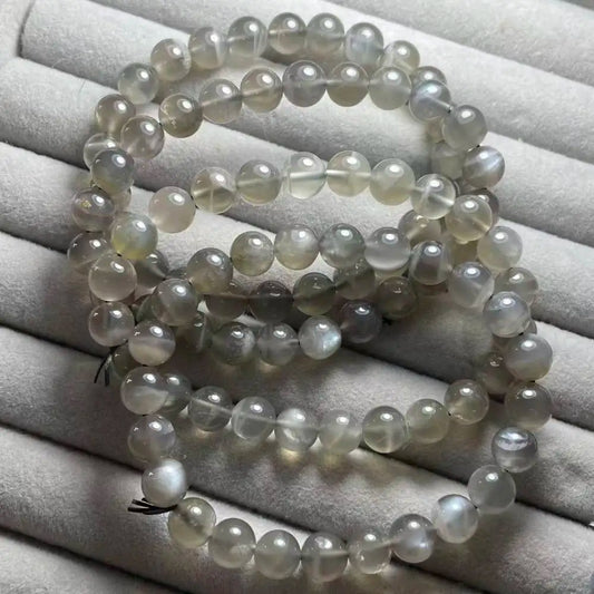 Numéro de liquidation (17) : 4 bracelets (voir photo) en pierre de lune grise naturelle d'environ 8 mm (vente en gros)