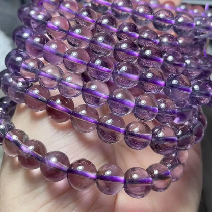 2 браслета. Примерно 8 мм натуральных прозрачных светло-фиолетовых бусин из амтиезного кварца.